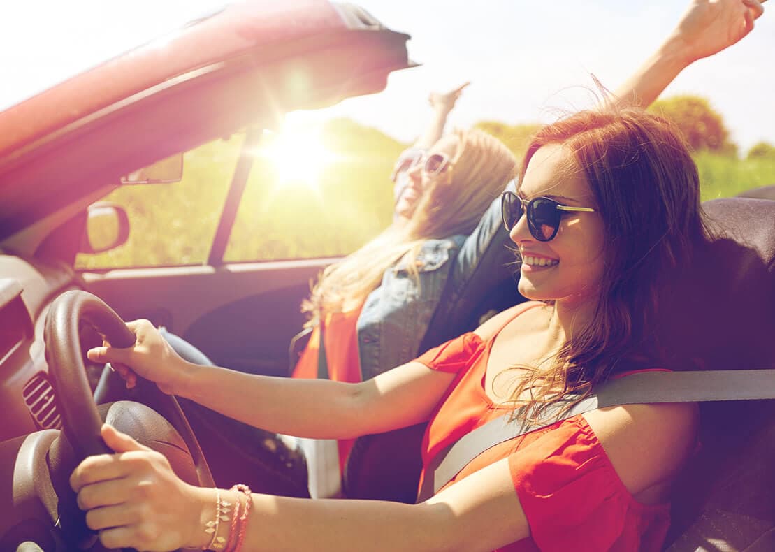 Auto Sales - Two Girls in Car